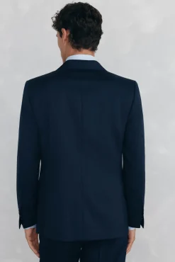 Blazer estruturado com costas azuis e corte sob medida