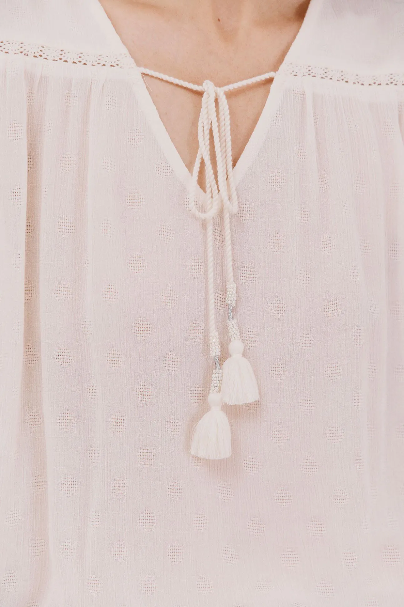 Blusa com borlas
