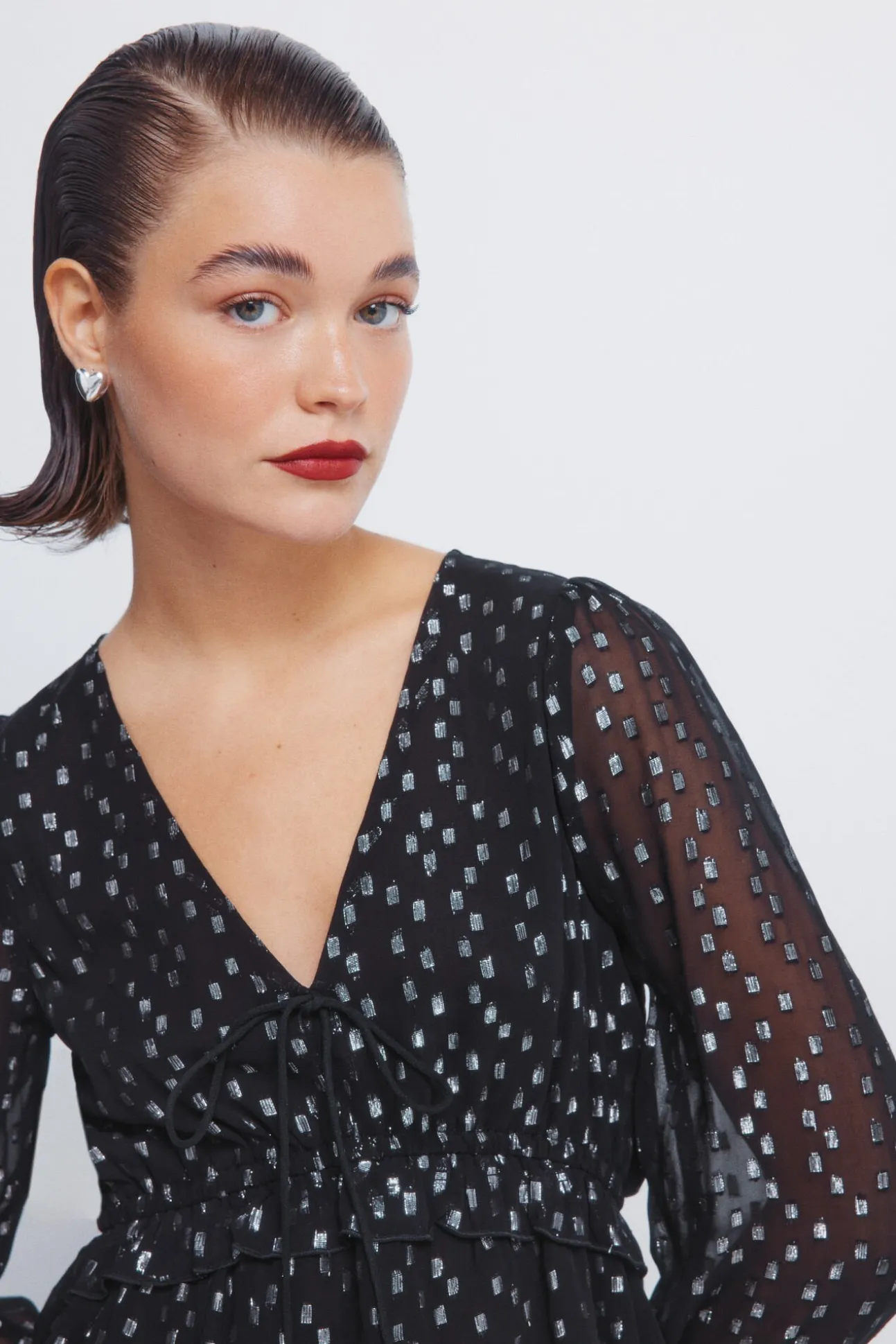Blusa de lurex com cós elástico