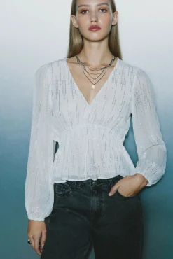 Blusa de lurex com cós elástico