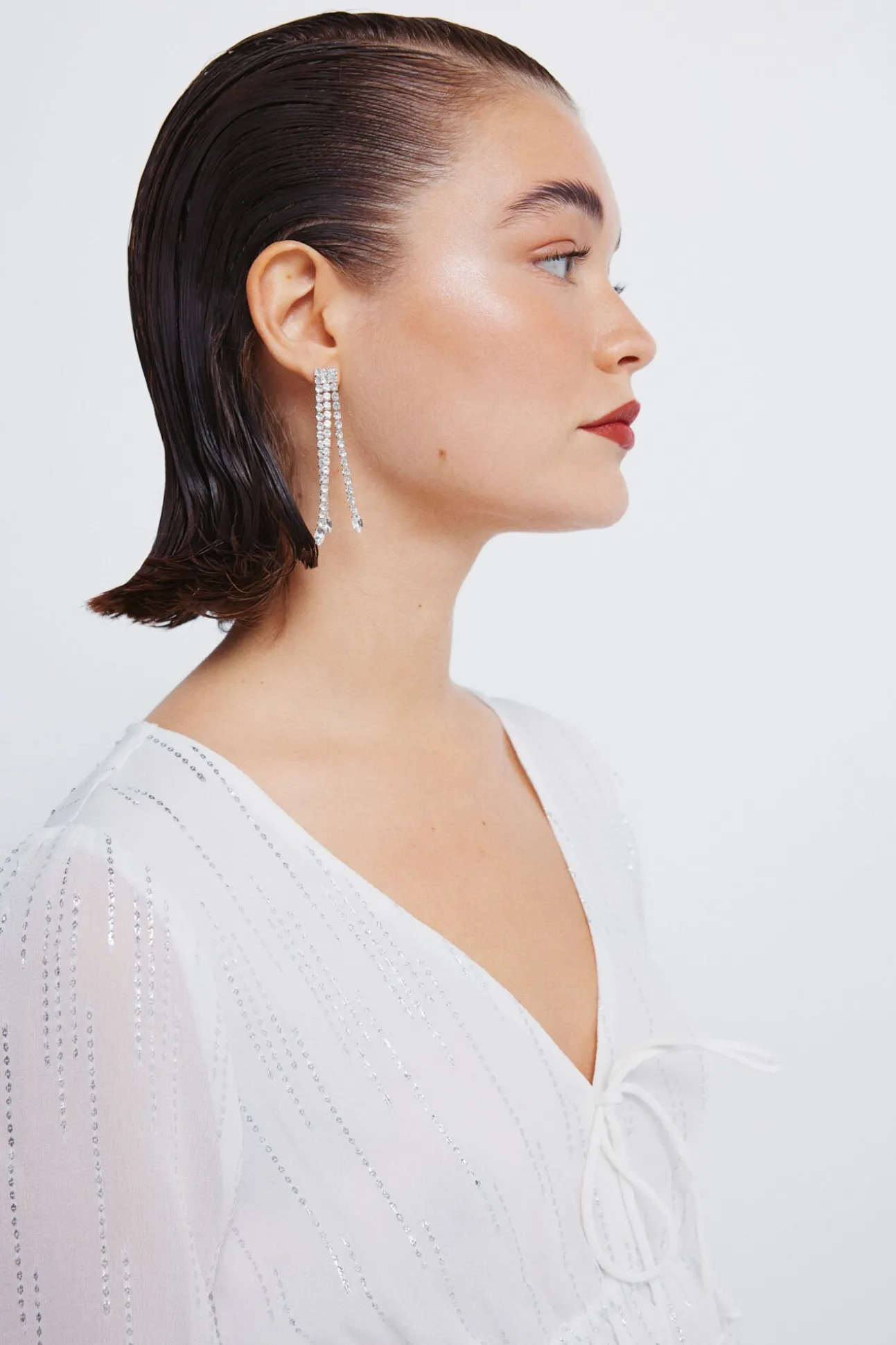 Blusa de lurex com cós elástico
