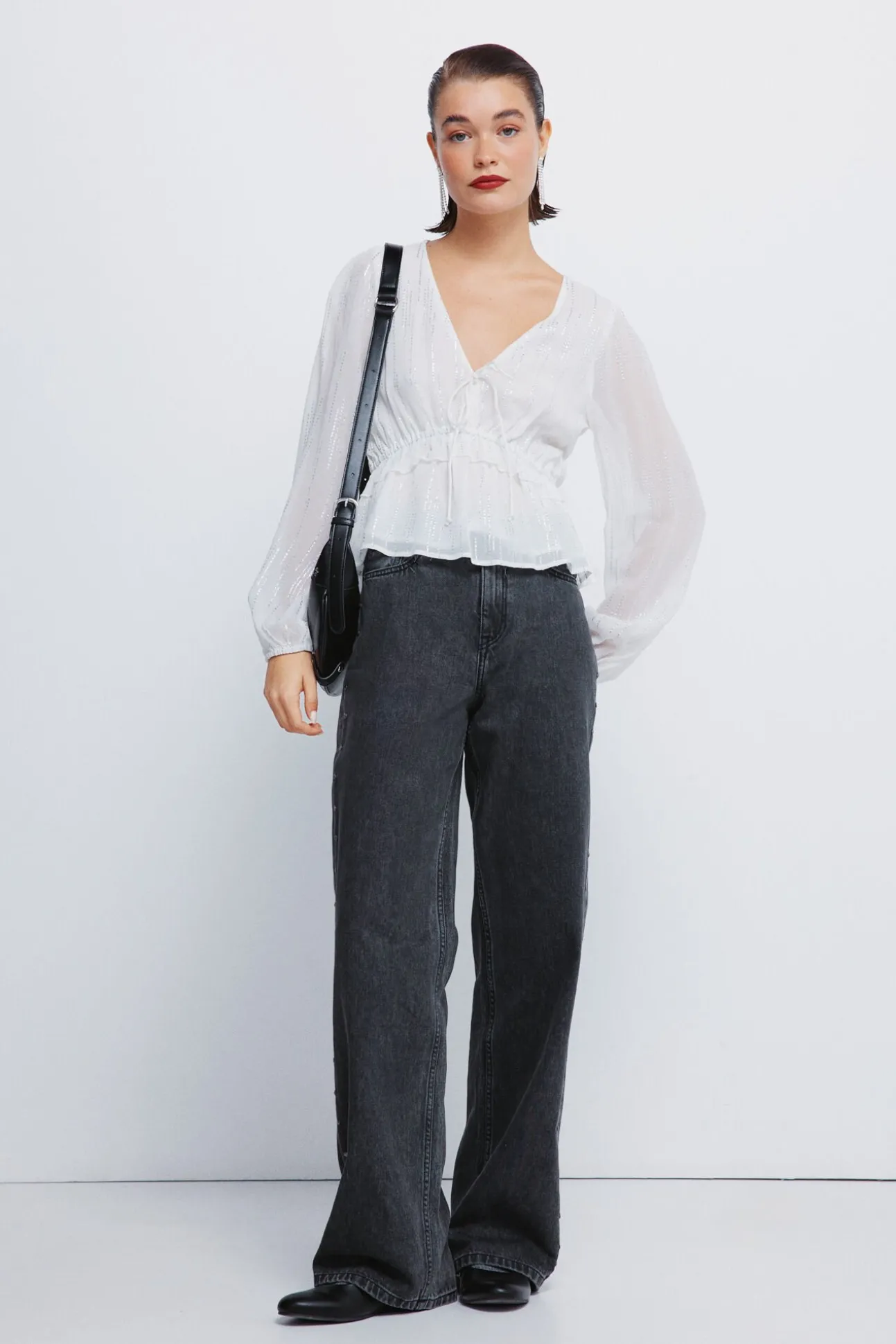 Blusa de lurex com cós elástico