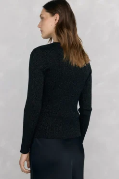 Blusa de malha brilhante com aberturas
