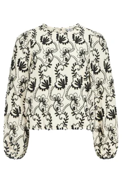 Blusa de tecido bordado