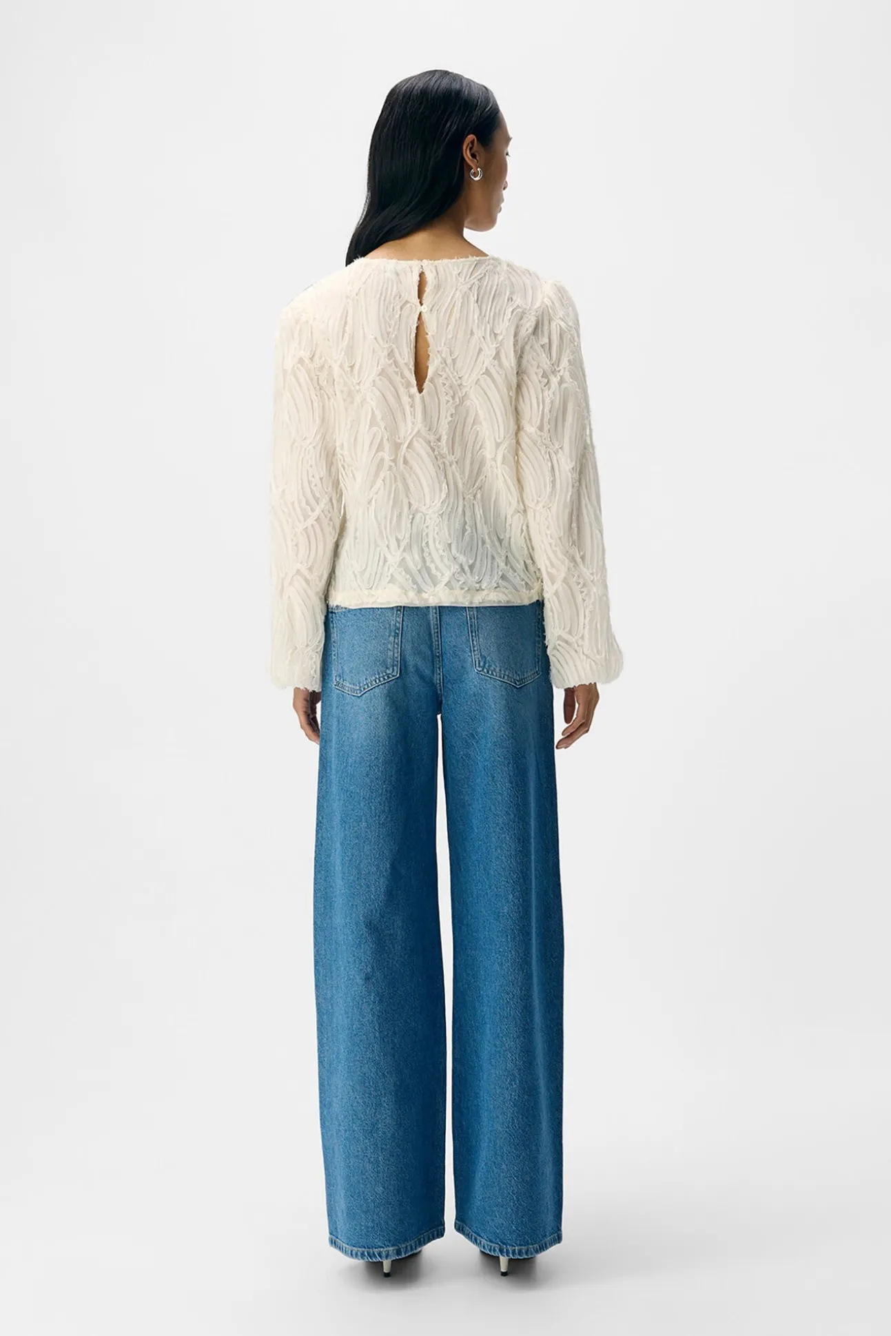 Blusa de tecido texturizado