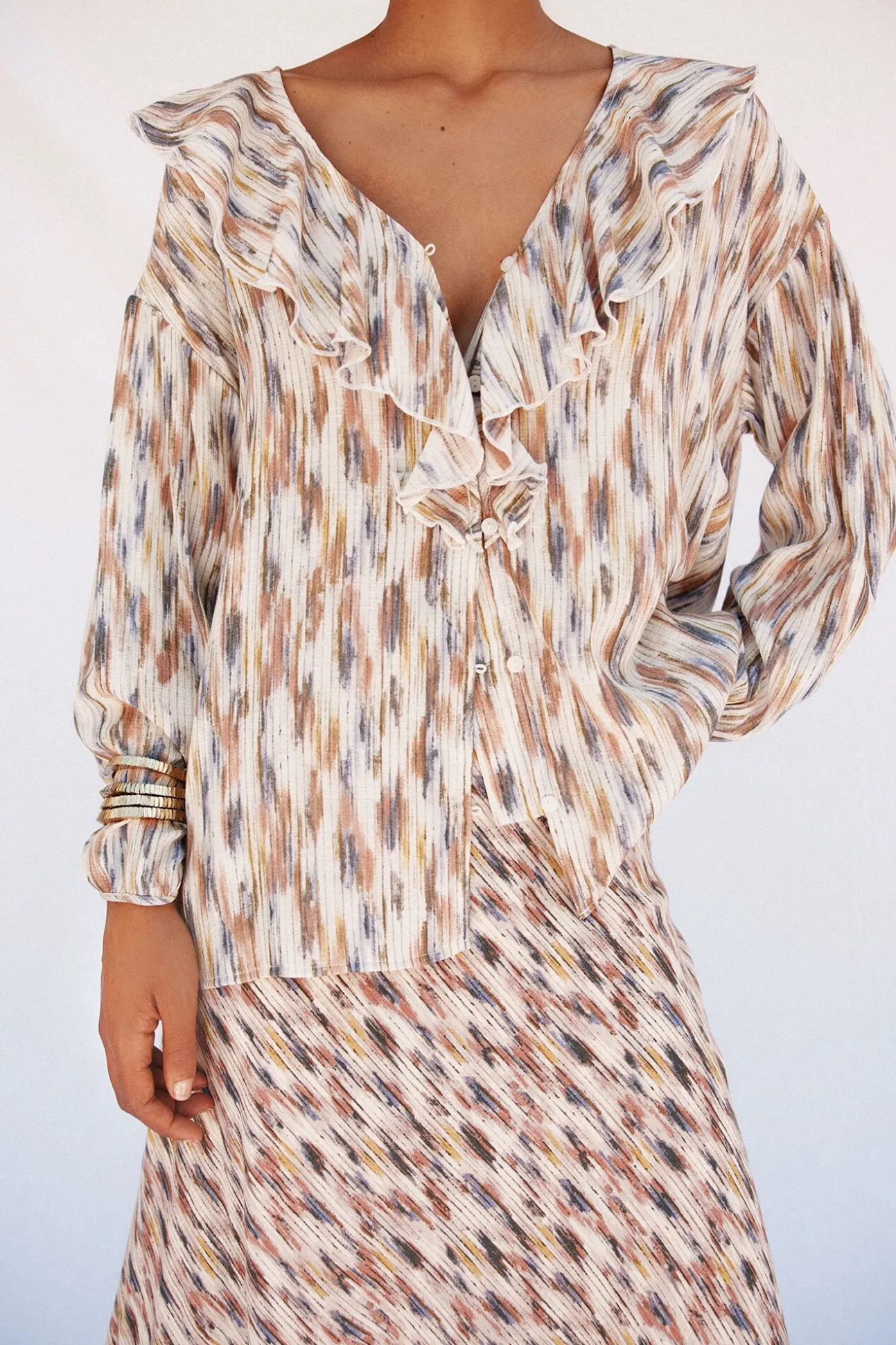 Blusa estampada com folhos