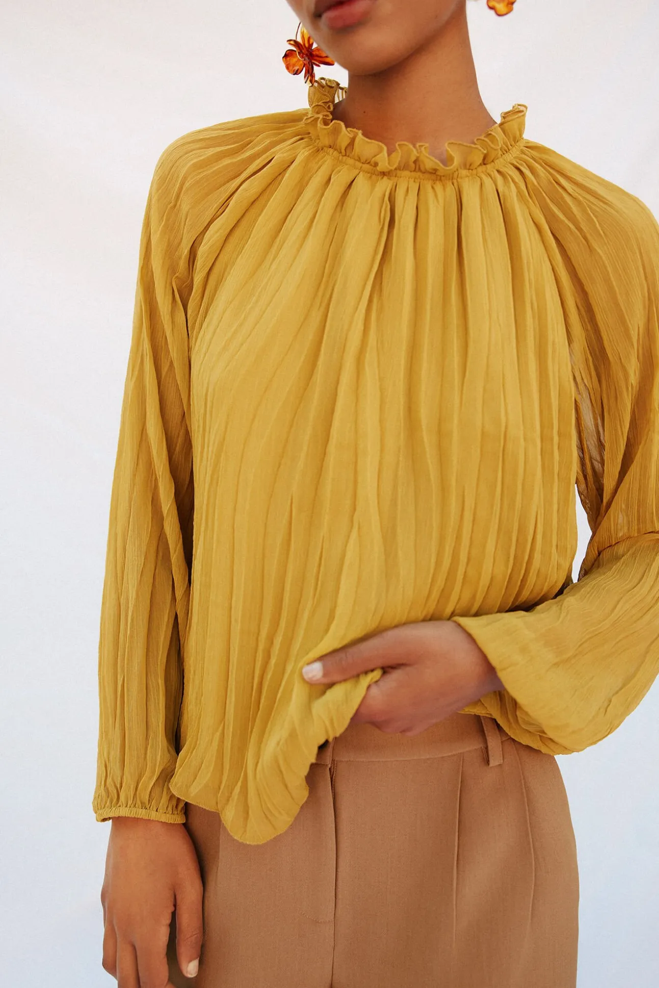 Blusa fluida e franzida