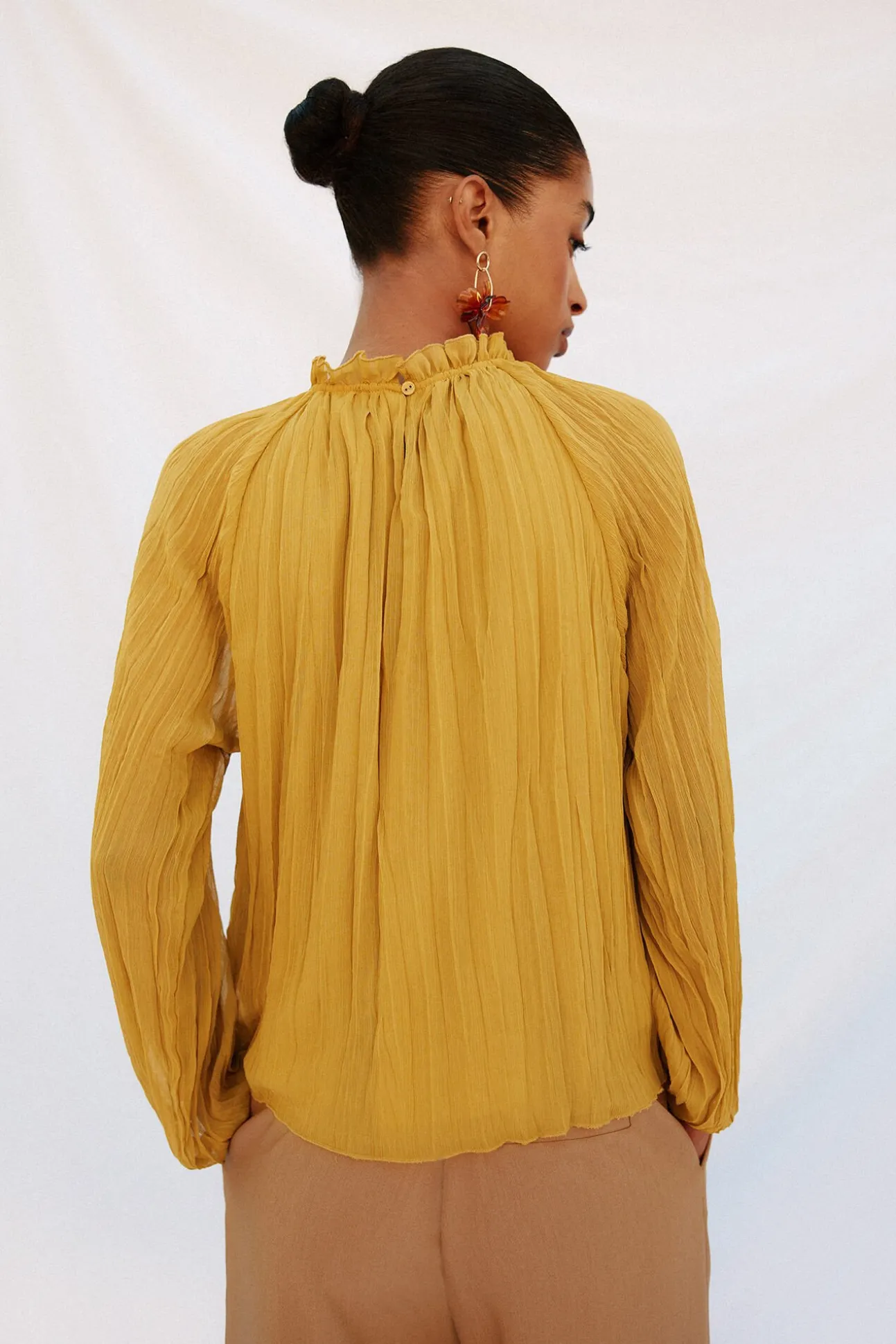 Blusa fluida e franzida