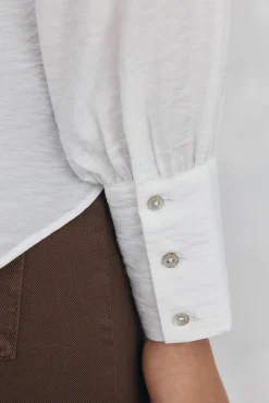 Blusa lisa e solta