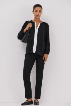 Blusa plissada contrastante