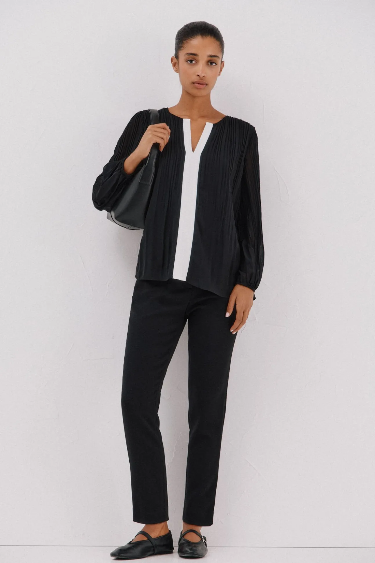 Blusa plissada contrastante