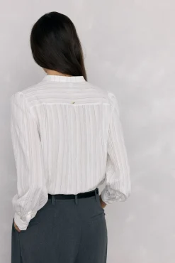 Blusa riscas com folho