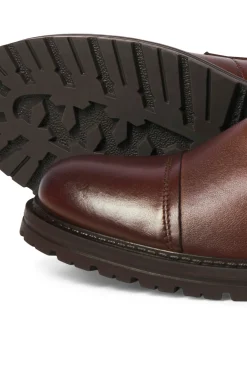 Bota com fivela de pele