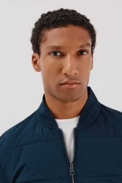 -Regular fit-Fleece fabric combined with technical fabric-Front zip fastening, bomber neck and side pockets-By buying our cotton products, you're supporting our investment in the Better Cotton initiative. This product has been sourced using