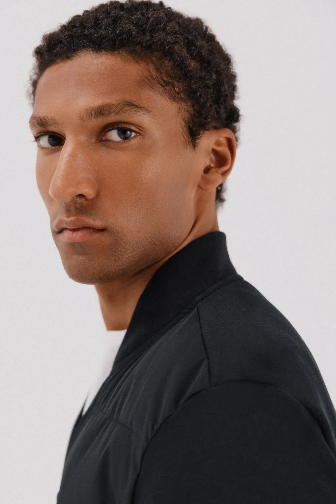 -Regular fit-Fleece fabric combined with technical fabric-Front zip fastening, bomber neck and side pockets-By buying our cotton products, you're supporting our investment in the Better Cotton initiative. This product has been sourced using