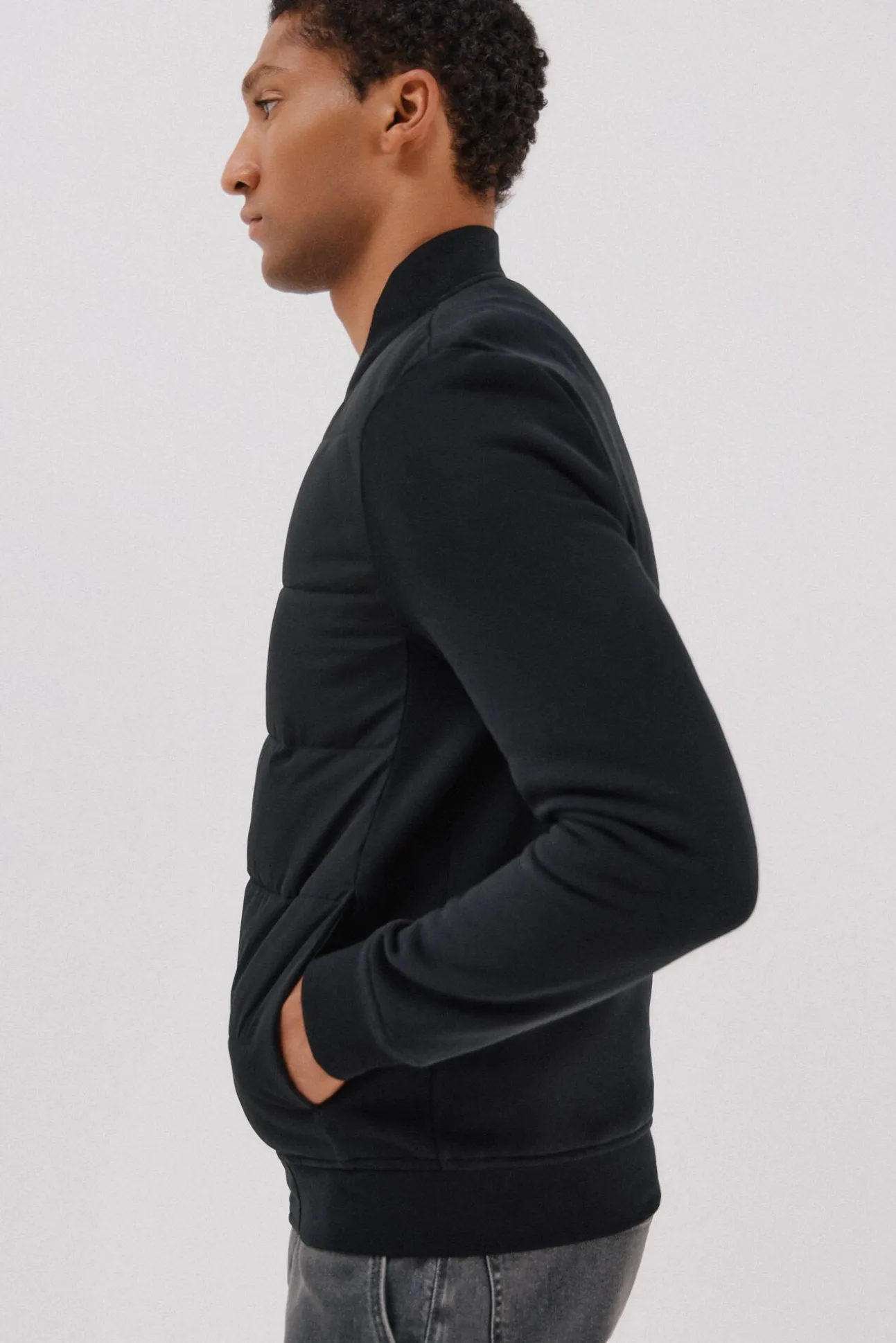 -Regular fit-Fleece fabric combined with technical fabric-Front zip fastening, bomber neck and side pockets-By buying our cotton products, you're supporting our investment in the Better Cotton initiative. This product has been sourced using