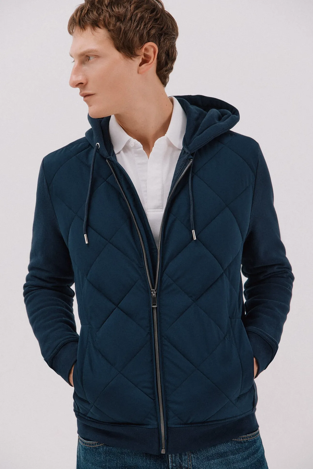 -Regular fit-Sweatshirt fabric combined with technical fabric-Front zip fastening, hood and side pockets-By purchasing our cotton products, you are supporting our investment in the Better Cotton initiative. This product has been obtained th