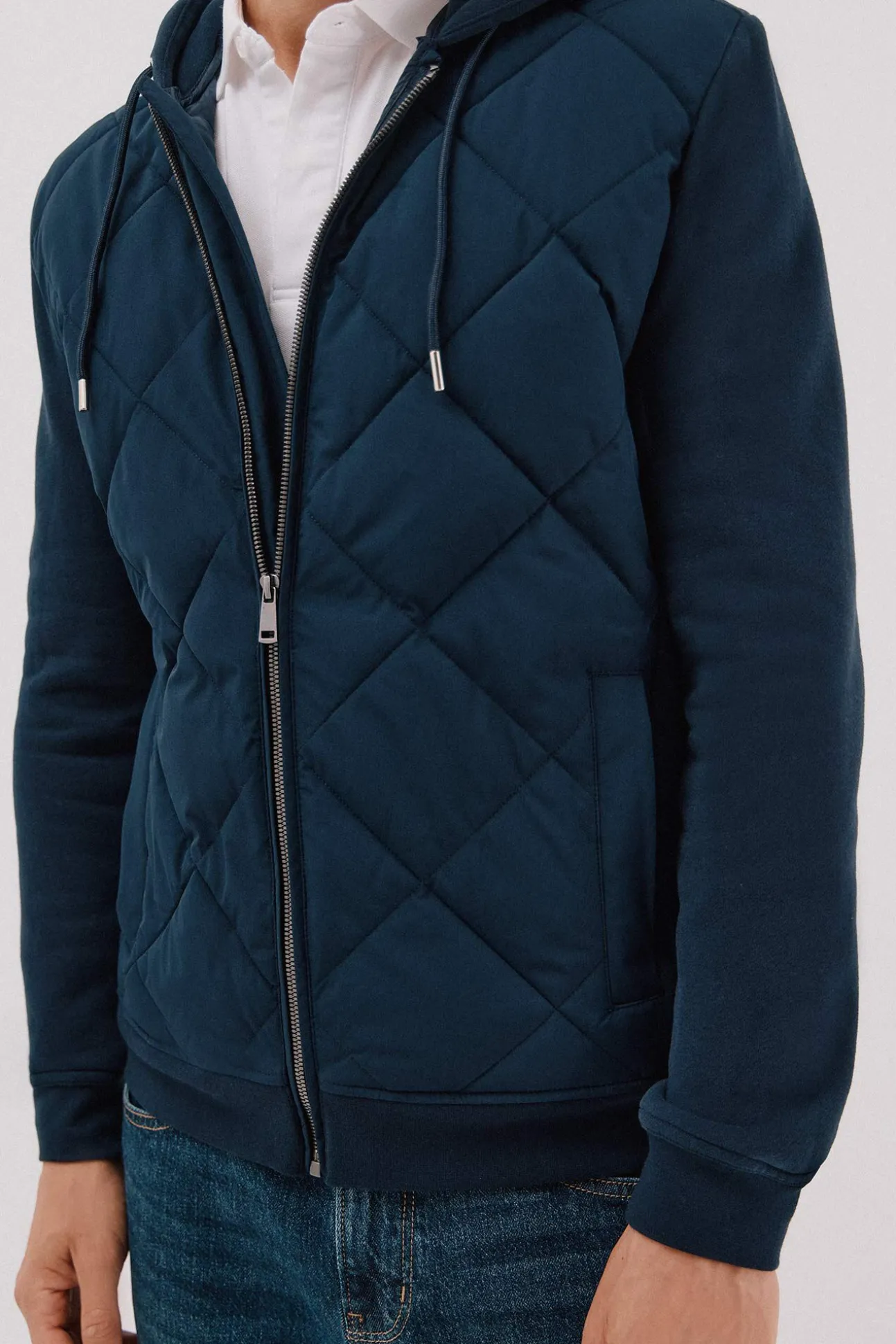 -Regular fit-Sweatshirt fabric combined with technical fabric-Front zip fastening, hood and side pockets-By purchasing our cotton products, you are supporting our investment in the Better Cotton initiative. This product has been obtained th