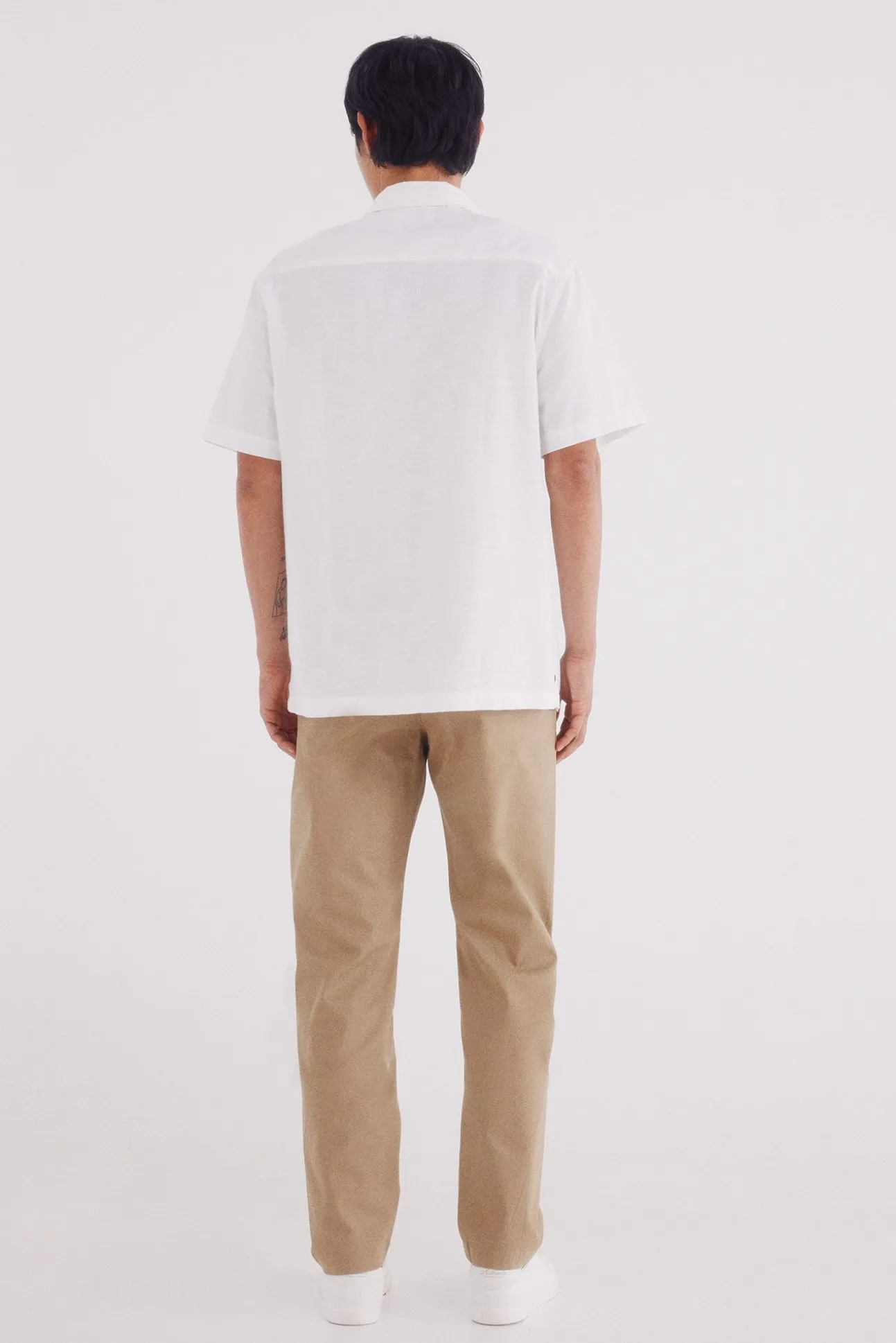 Calça calças chino slim fit com micro estampa