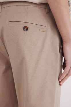 Calça calças chino slim fit com micro estampa