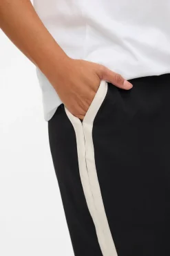 Calça de cintura elástica plus size