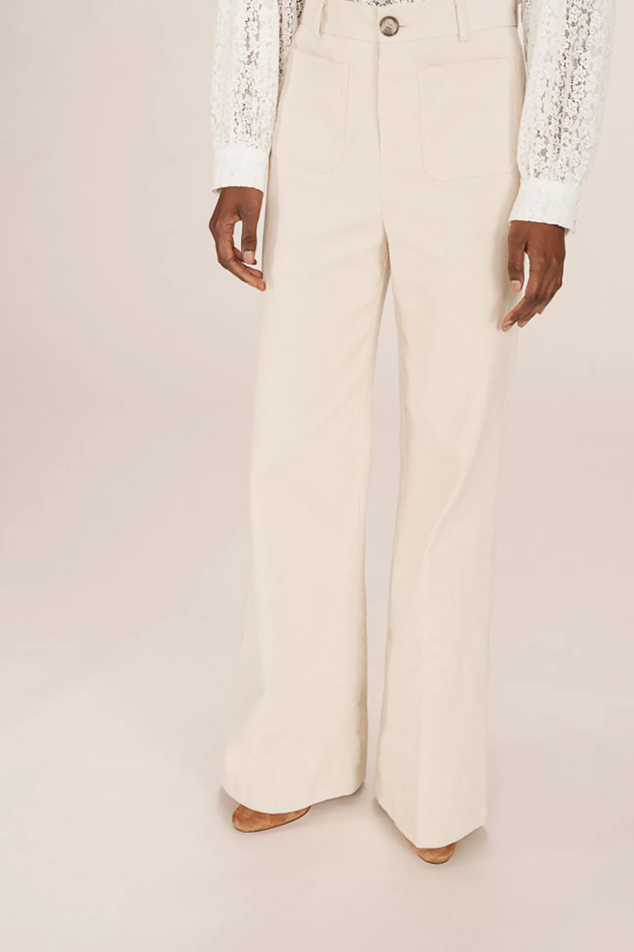 Calça de veludo cotelê com bolsos frontais
