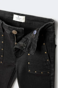 Calça flare com tachas para meninas