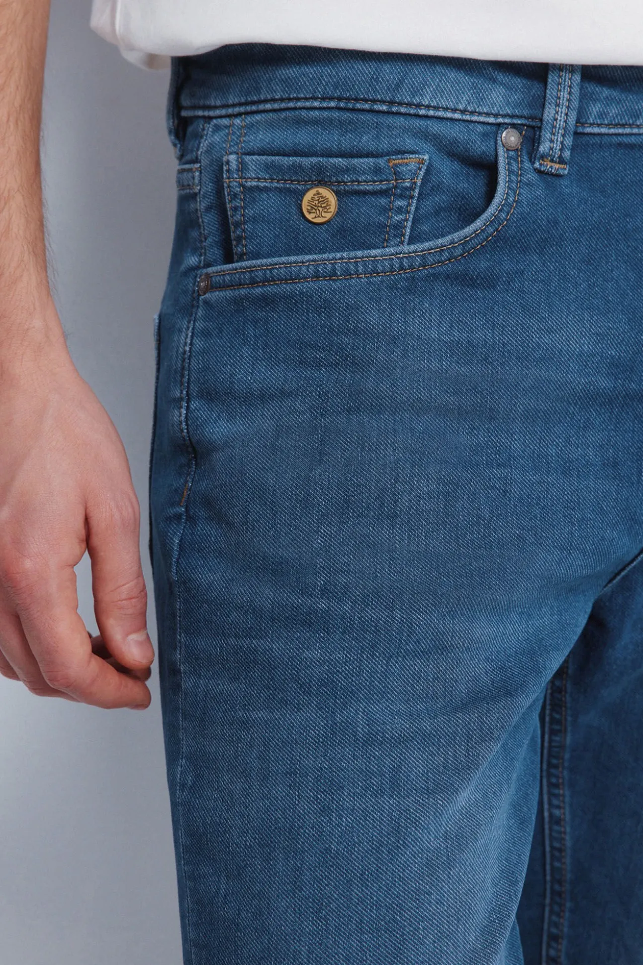 Calça jeans de malha slim fit