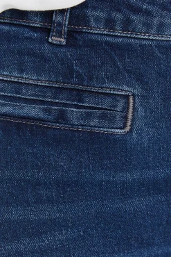 Calça largas com bolsos debrum