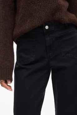 Calça largas com bolsos frontais