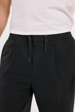 Calça largas com pregas