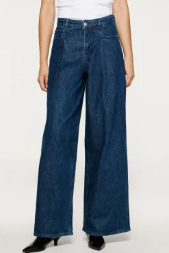 Calça plissado de algodão orgânico.