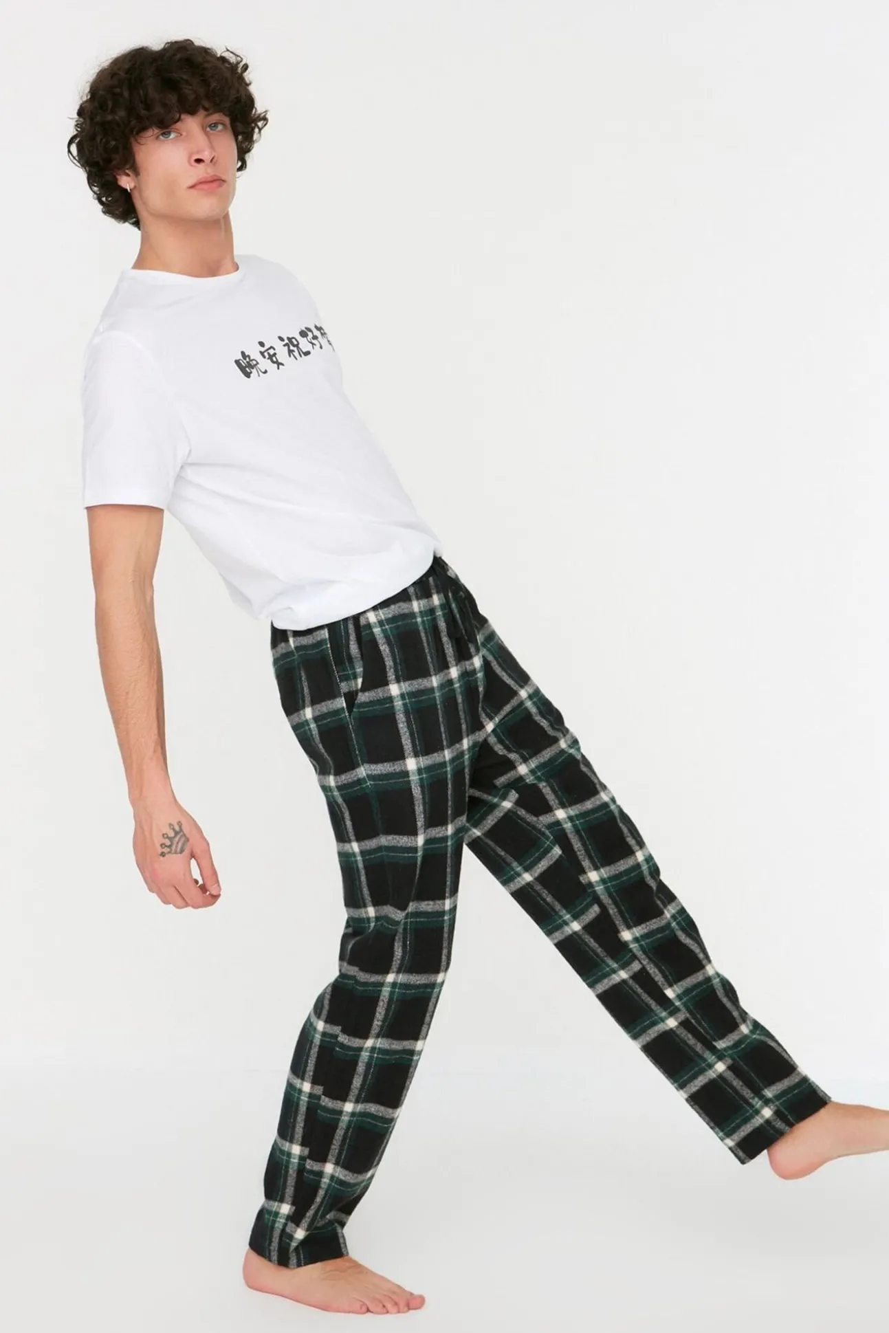 Calça unissex de corte regular com estampado xadrez multicolorida