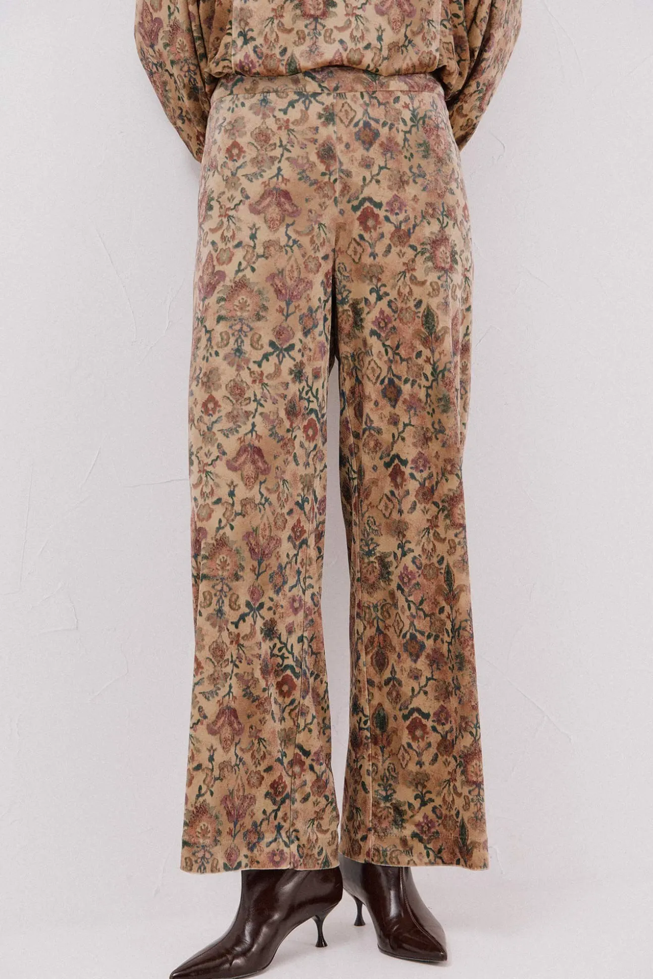 Calças de veludo estampado