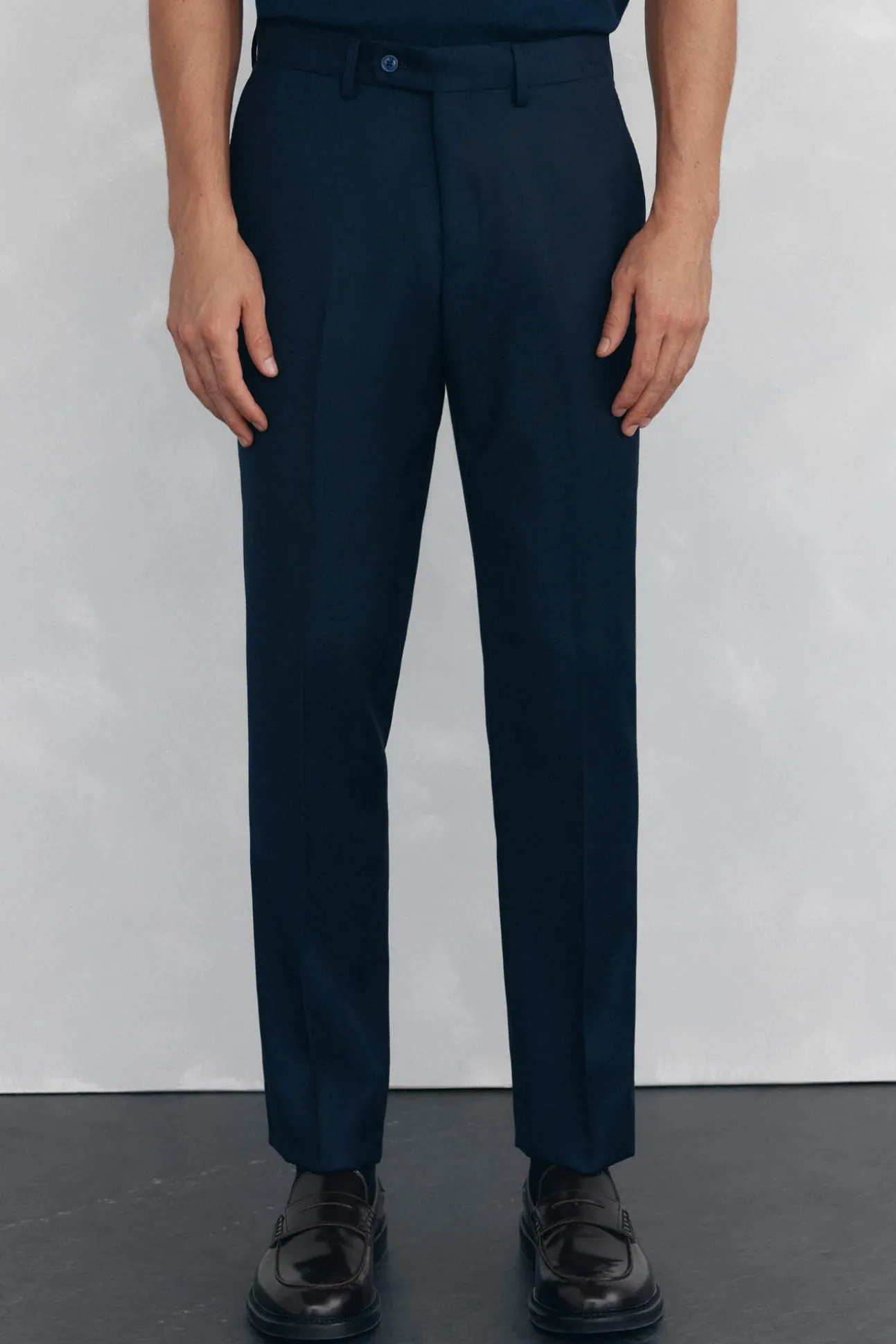 Calças estilo olho de pássaro, com modelagem slim fit e bielástica
