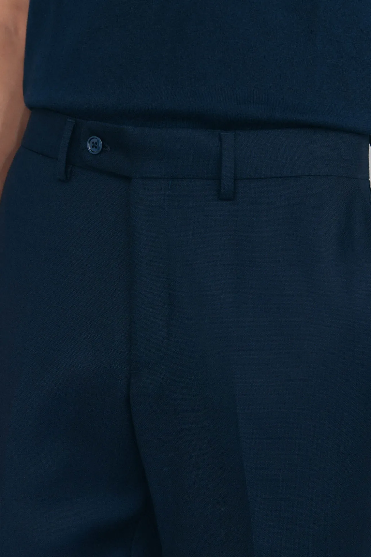 Calças estilo olho de pássaro, com modelagem slim fit e bielástica