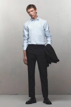 Camisa de manga comprida de vestir 100% algodão.