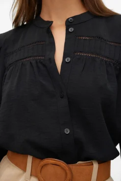 Camisa de manga comprida com aberturas