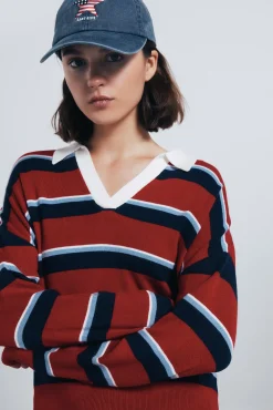 Camisa polo riscas