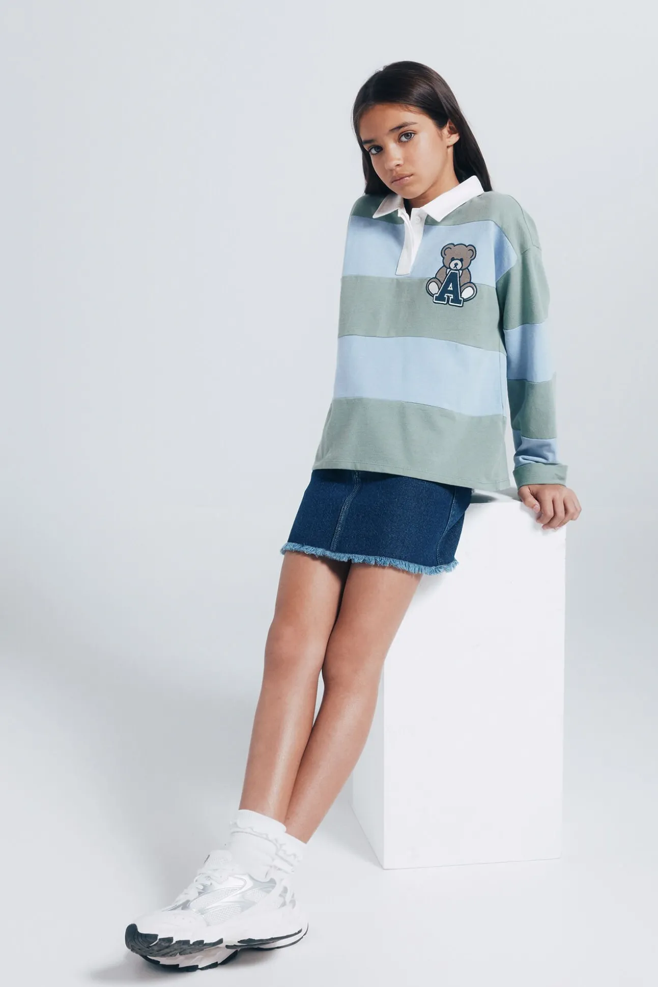 Camisa polo riscas para menina