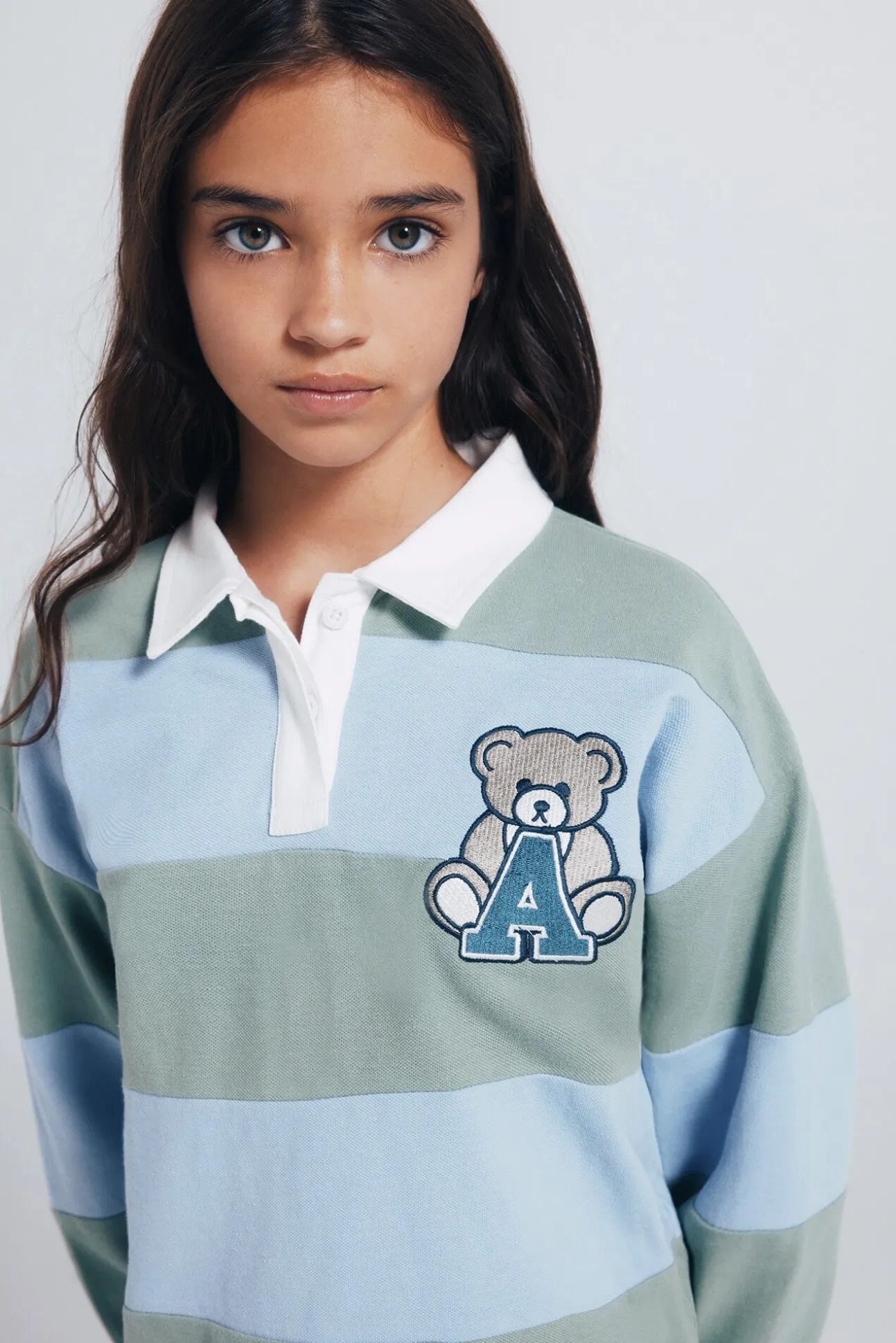 Camisa polo riscas para menina