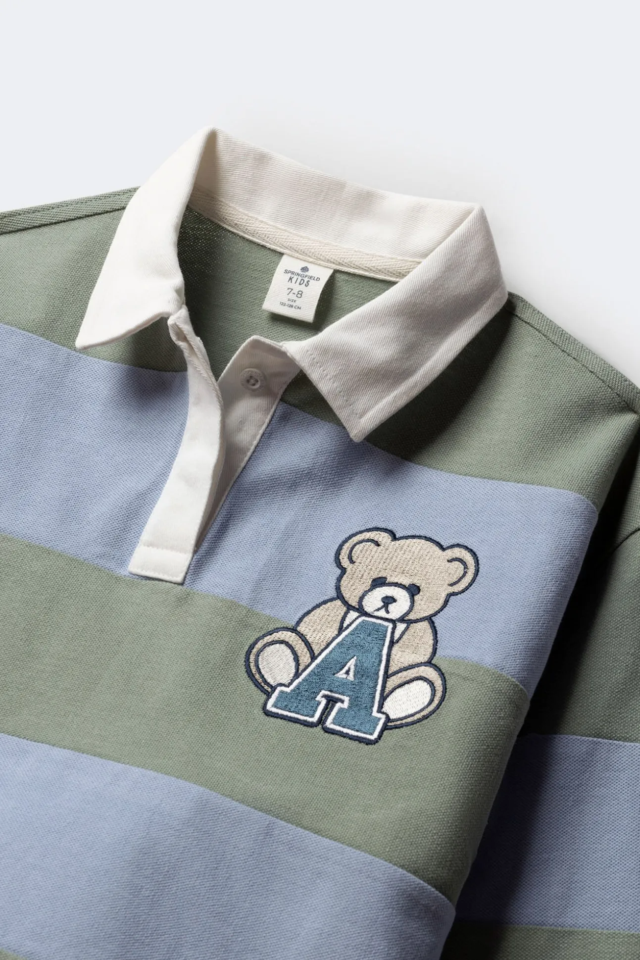 Camisa polo riscas para menina