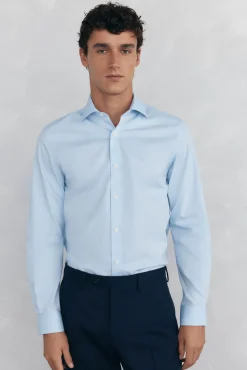 Camisa social lisa que não pode ser passada a ferro + resistente a manchas