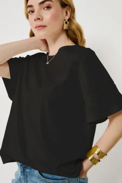 Camiseta de algodão orgânico com vazados