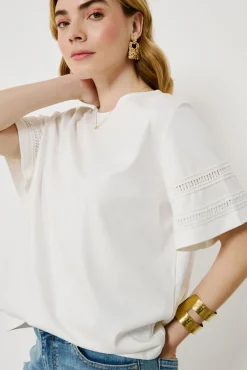 Camiseta de algodão orgânico com vazados