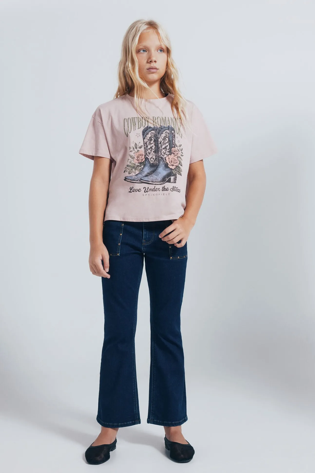 Camiseta feminina com botas de cowboy