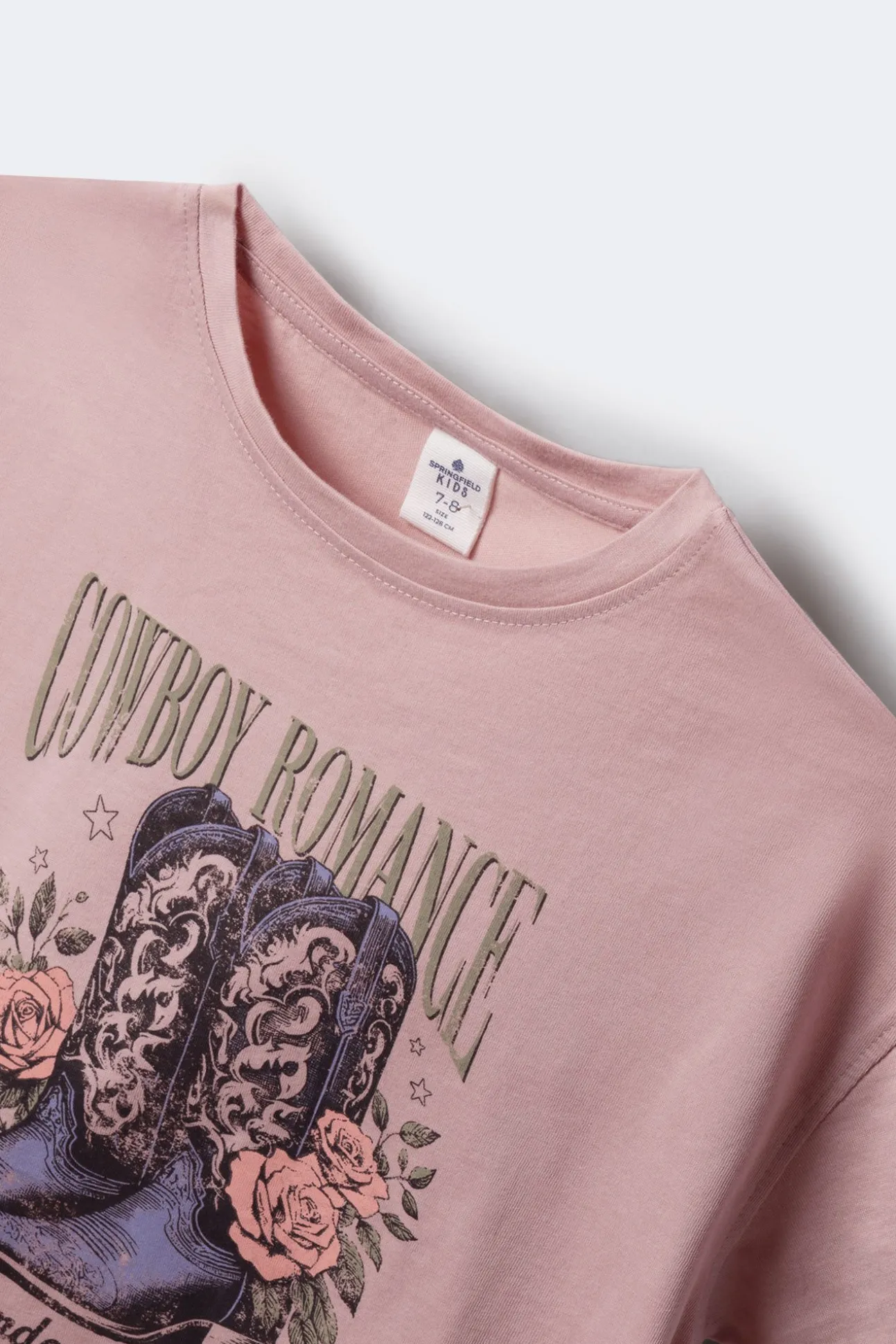 Camiseta feminina com botas de cowboy