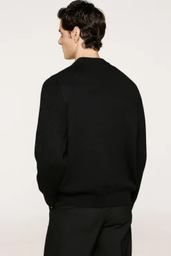 Camisola de gola alta 100% algodão orgânico.