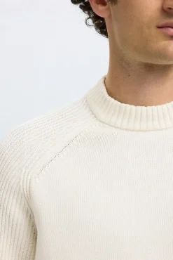 Camisola de gola alta 100% algodão orgânico.