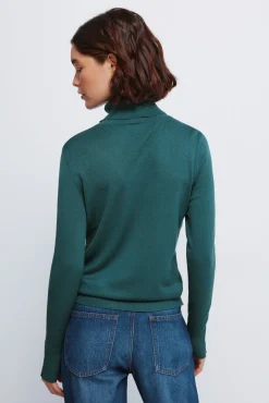 Camisola de gola alta com botões e punhos